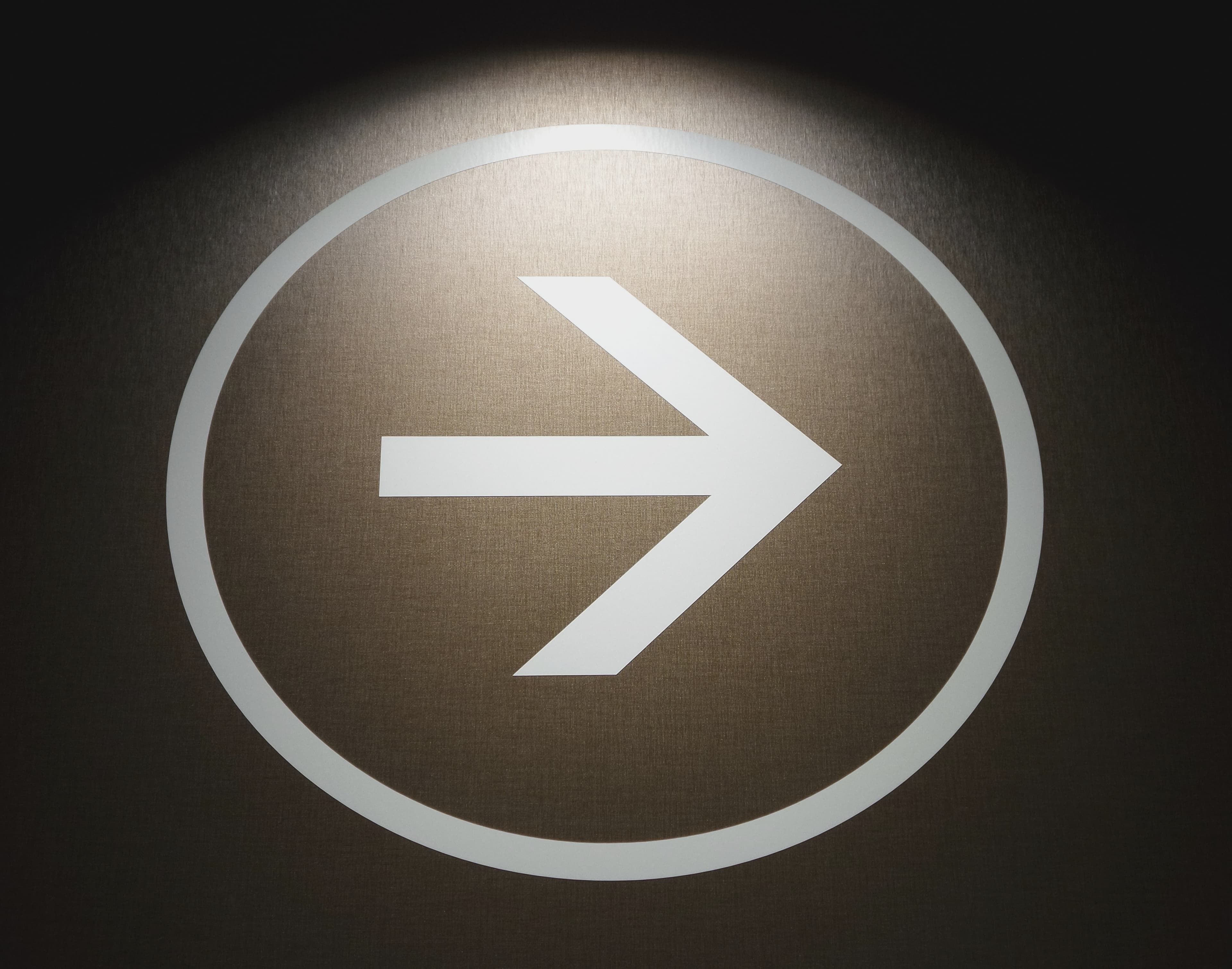 illuminated arrow on road